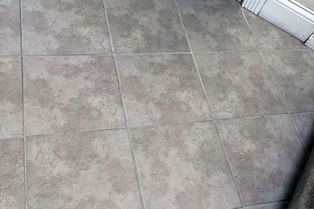 Dirt disappears from grout after applying Ultra One Heavy Duty